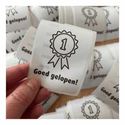 Sticker voor avondvierdaagse met tekst ‘Goed gelopen’. Leuk voor een traktatie.